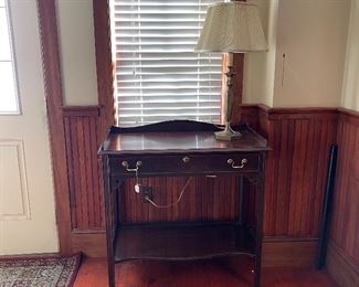 Foyer, or small butlers table. Brass Lamp.