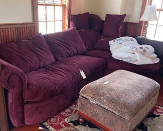 Sofa with chaise, good condition faux suede. Can sleep on it or lounge. Ottman with storage... lamp rug  and quilt all for sale...