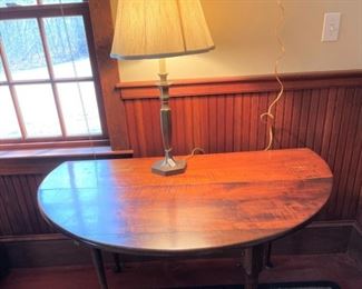 Nice round drop leaf table, area rug and lamp all for sale.