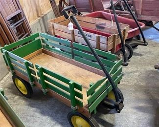 John Deere and radio flyers wagons. 2 wooden wheel barrows...