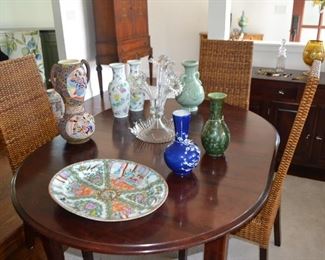 Dining table by Thomasville Colors.  Comes with two leaves not shown.  4 chairs seats minor breakage.