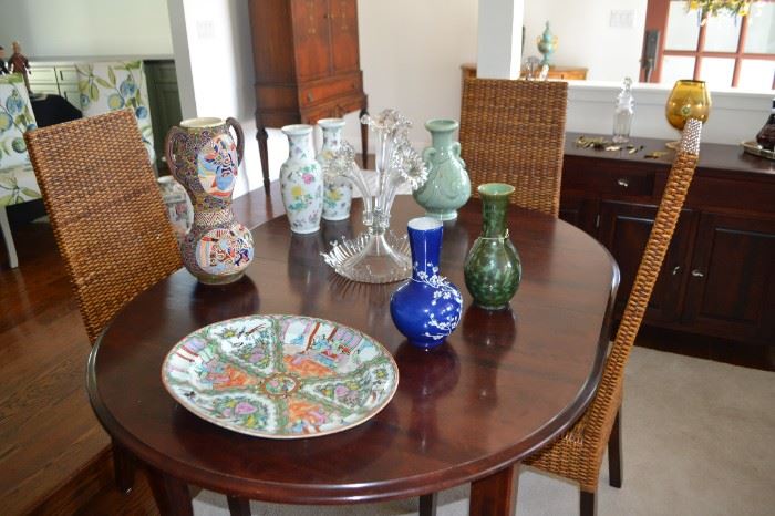 Dining table by Thomasville Colors.  Comes with two leaves not shown.  4 chairs seats minor breakage.