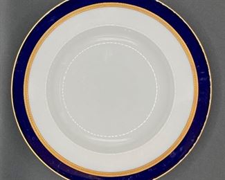 This beautiful vintage cobalt and gold set of porcelain by CM Hutschenreuther in Bavaria consists of 18 dinner plates, 6 salad plates, 6 soup bowls and 12 each of bread and butter plates, and cups and saucers.