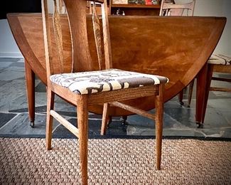 Four Mid century walnut chairs, Dunbar furniture walnut drop leaf oval table