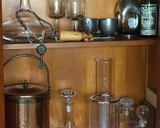 Madmen era barware in glass, copper, chrome, silver, pewter, bamboo, teak, lucite