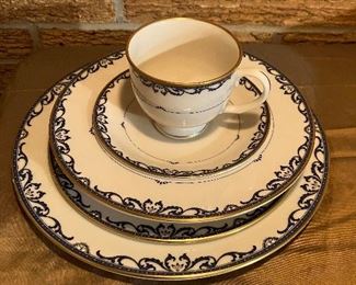 Partial set of Lenox "Liberty" Presidential Collection China consisting of 9 dinner plates, 5 salad plates, 5 bread and butter plates, 2 soup bowls, 3 saucers, 2 tea cups, and 1 open vegetable bowl.