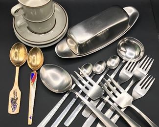 Arabia coffee cups, Finland; A. Michelsen 1958 and 1966 vermeil Christmas Spoons, Denmark; WMF Fraser modernist butter dish, Germany; Gense stainless flatware partial set, Sweden.
