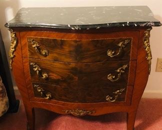 French Commode/ Chest Bombe’ Form with Marquetry Inlay and Bronze Mounts marble top.  19th century 
Pair
