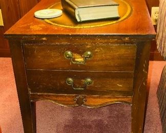 Oval leather top end table
