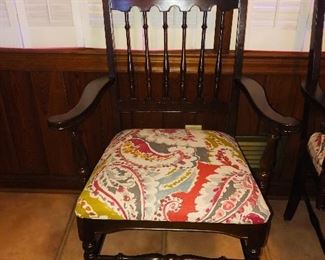 There are 6 of these chairs one arm chair