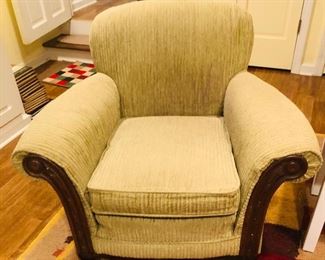 Upholstered chair with mahogany accents