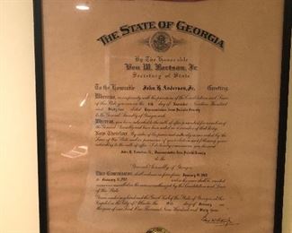 Document signed by Secretary of State Ben Fortson acknowledging John Henry as the representative from Pulaski Co to the general assembly of Ga. Jan 1963-Jan 1965. With Ga seal