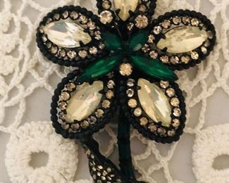 Vintage flower brooch.  Lots of costume jewelry 
