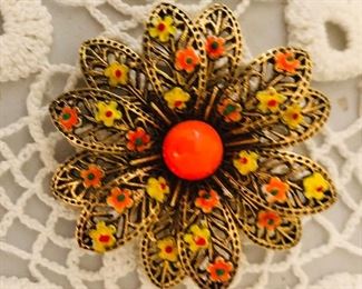 Vintage flower brooch.  Lots of costume jewelry 