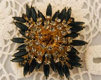 Vintage  brooch.  Lots of costume jewelry 