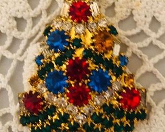 Vintage  brooch.  Lots of costume jewelry 