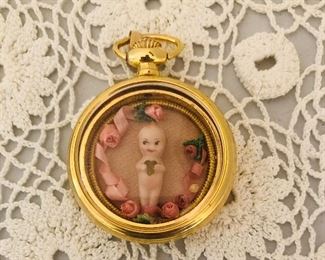 Vintage kewpie doll slide