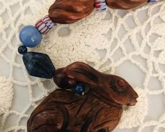 B Gould hand made necklace 
Sodalite knack beads, fossils , precious woods and Chinese porcelain 