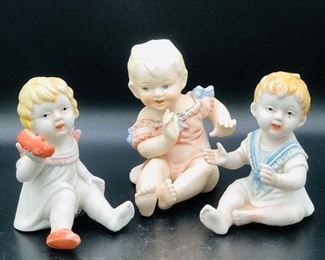 Sweet Vintage Bisque Porcelain Piano Babies  hand painted 