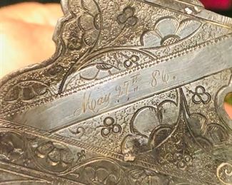 Antique Inkwell & Pen Holder 


Cast Iron Frame Glass Bottle dated with name 125
May 27 1886
——-T Hopkins