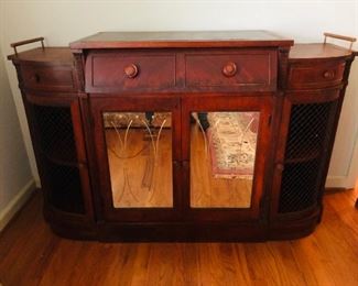 Antique buffet with top drawer desk and mirrored doors 