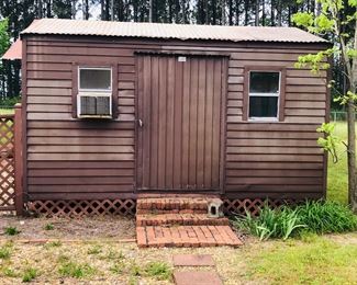 This storage building has insulated walls and ceiling. It is wired for electricity.  You move it. 
