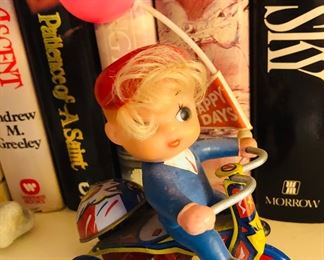 Vintage tin toy
Vtg 1960’s Boy In Suit On Tricycle HAPPY DAYS flag Balloon Wind Up  toy 

