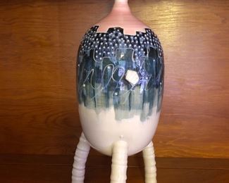 Handmade pottery
City tripod night vision 
Signed