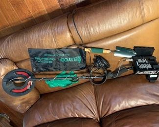 Metal Detector White III and Leather couch $ 145.00 for well Loved real Leather couch