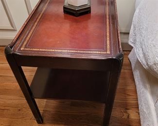 Leather inset tiered side tables