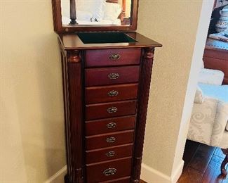 8 Drawer Jewelry Armoire with with mirror and 2 side swing doors with necklace hooks.