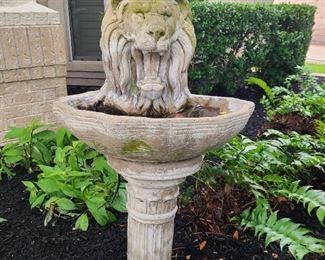 Lions head cement fountain/birdbath