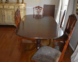 Antique Mahogany Dining Table with 6 Chairs. 42" W X 104" L (includes Leafs) 