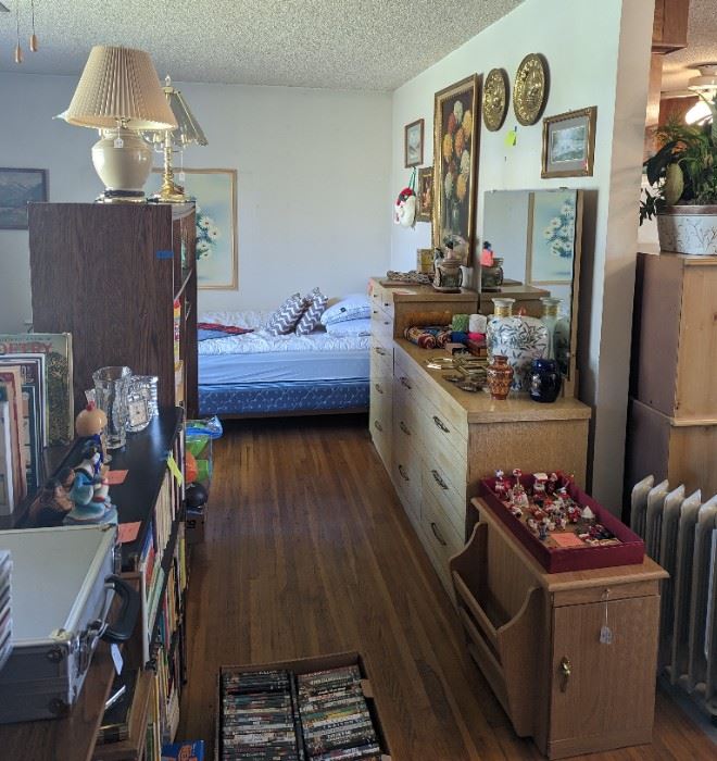 Full bed set (w bookcase headboard), dresser/mirror, chest of drawers, reading table, bookshelves, etc.