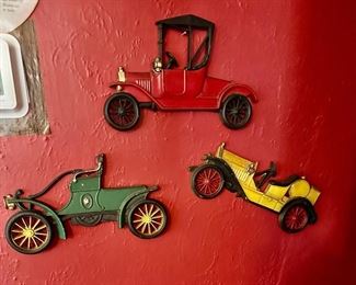Antique car metal wall hangings (2 sets)