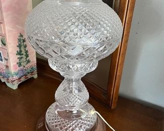 many crystal and glass lighting fixtures