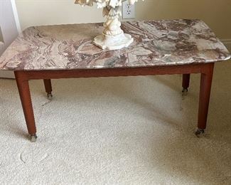 	#16	Coffee table with marble top from Italy on teak base from 1950s 34.5x20x15.5 "As is" repaired crack	 $80.00 				