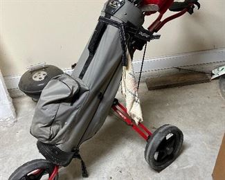 	#82	Golf club set with Bag Boy pull cart with gloves	 $100.00 				
