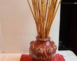 Large ceramic vase 17" tall with bamboo rods, overall height is 36"