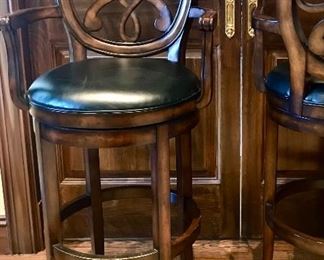 Pair Frontgate scroll back swivel barstools with black leather seats
22” x 20 x 48” h seat 30.5” h

Was $950
Now $350