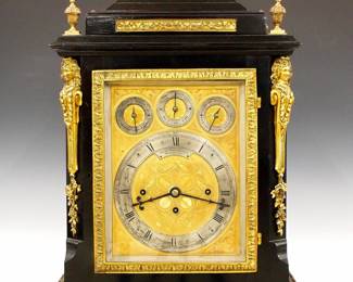 Lot 70: A late 19th/early 20th century English Bracket clock retailed by "Bailey, Banks & Biddle, Philadelphia".  High quality 8-day triple fusee movement with quarter hour Westminster/8 Bell striking on a nest of eight Bells and 5 coiled gongs, engraved Gilded Brass dial with arched top, Silvered chapter ring with Roman numerals, upper Chime/Silent, Slow/Fast and Westminster/Chime on Eight Bells subsidiary dials.  Ebonized Georgian Style case with original Ebonized finish and fine cast Brass mounts, finials, door and paw feet.  Minor finish wear, small shrinkage cracks, running and chiming when cataloged.  26 1/2" high overall.  ESTIMATE $4,000-6,000
