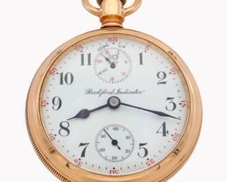 Lot 73: A 14k Gold Rockford "Indicator" model Railroad Grade 950 pocket watch with UP/DOWN wind indicator.  18 size, 21 j, Adj 5 pos, DR, DMK, GJS, SW, LS, B. W. C. Co. 14K Gold, OF, porcelain DSD with Arabic numerals marked "Rockford Indicator", serial #908105.  153.1 grams total weight.  Minor wear, re-cased with cut front cover, winds, sets and running when cataloged.  ESTIMATE $4,000-5,000
