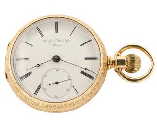 Lot 82:  A 14k Gold Rockford model 2 pocket watch.  18 size, 15 j, SW, LS, Fancy C. W. Mfg. Co. 14K Gold, OF, Porcelain SSD with Roman numerals marked "Rockford Watch Co., Illinois", serial #104394.  132.4 grams total weight, movement weighs 67.4 grams.  Minor wear, re-cased with cut front cover, winds, sets and running when cataloged.  ESTIMATE $2,000-3,000
