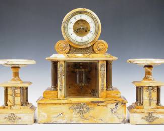 Lot 100: A late 19th century French three piece Sienna Marble clock set, marked "Comptoir General, J. Pratt, Paris...".  8-day time and strike movement with visible escapement, Gilded Bronze & porcelain dial, Arabic numerals and a two cylinder Mercury pendulum, serial #27584.  Louis XVI Style Sienna Marble case with Gilded Bronze mounts and Brass fluted columns on clock and garnitures.  Some wear, edge chips to Marble, running when cataloged.  19 1/4" high overall.  ESTIMATE $1,000-1,500

