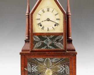 Lot 104:  A late 19th century Birge & Fuller Sharp Gothic Steeple on Steeple shelf clock.  30-hour time and strike movement with "Wagon Spring" power, marked "C. Boardman, Bristol, Conn, USA" with a painted metal dial and Roman numerals.  Mahogany case with shaped upper door with clear dial glass and reverse painted lower flanked by single turned Candlesticks, above a lower door with reverse painted glass, old paper retailer's label inside.  Old finish with some wear, large chip in backboard, touch-up to dial edges, running when cataloged.  21 3/4" high overall.  ESTIMATE $1,000-1,500
