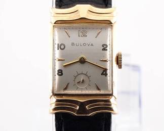 Lot 123:  A vintage Bulova 14k Gold gentleman's wristwatch.  Manual wind, 21j movement with a Silvered dial, Arrow markers and subsidiary seconds, serial #6433403 on case back.  21 x 34 mm 14k Yellow Gold case with fancy lugs and a replaced leather band.  24.9 grams total weight.  Slight wear, winds, sets and running when cataloged.  ESTIMATE $600-800
