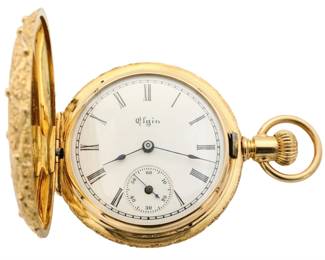 Lot 124:  A 14k Gold Elgin ladies pendant watch.  0 size, 7 j, SW, LS, Fancy beaded cushion A. W . C. Co. 14K Gold, HC, Porcelain SSD with Roman numerals marked "Elgin", serial #6514296.  41.5 grams total weight.  Minor case wear, winds well, stem very tight, running when cataloged.  ESTIMATE $600-800
