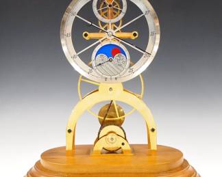 Lot 153:  A 20th century reproduction Great Wheel Skeleton clock.  Shaped Gilded Brass plates with a single chain driven fusee movement, skeletonized dial with Arabic numerals, outer minute dial with subsidiary seconds and lower hour dial.  Mounted on a molded Walnut base with Brass feet.  Minor wear, running when cataloged.  19 3/4" high overall.  ESTIMATE $800-1,200
