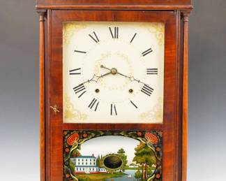 Lot 159: A 19th century Jerome & Darrow Pillar and Scroll shelf clock.  30-hr weight driven wooden time and strike movement with painted wooden dial and Arabic numerals.  Mahogany case with scrolled crest and Brass finials, single door with clear dial glass and reverse painted lower flanked by slender turned columns on a scrolled base.  Paper label 80% intact.  Older refinishing with minor damage, dial wear, restoration to crest and base, running when cataloged.  31 1/4" high overall.  ESTIMATE $600-800
