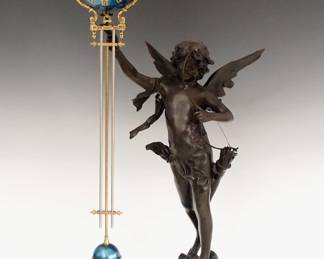 Lot 174:  A late 20th century Bronze figural Swinging Arm clock.  8-day time only movement within a Blue enameled sphere with Roman numerals with gridiron pendulum and Brass mounts.  Cast Bronze figure of Cupid with medium Brown patina on a molded Marble plinth.  Some oxidation and wear to the patina, running when cataloged.  37 1/2" high overall.  ESTIMATE $600-800
